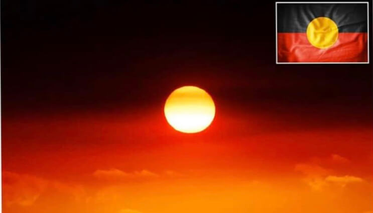 Aboriginal Flag in the skies over the bush fires